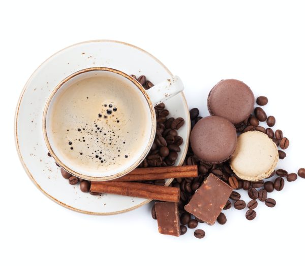 Coffee cup, chocolate and macaroons